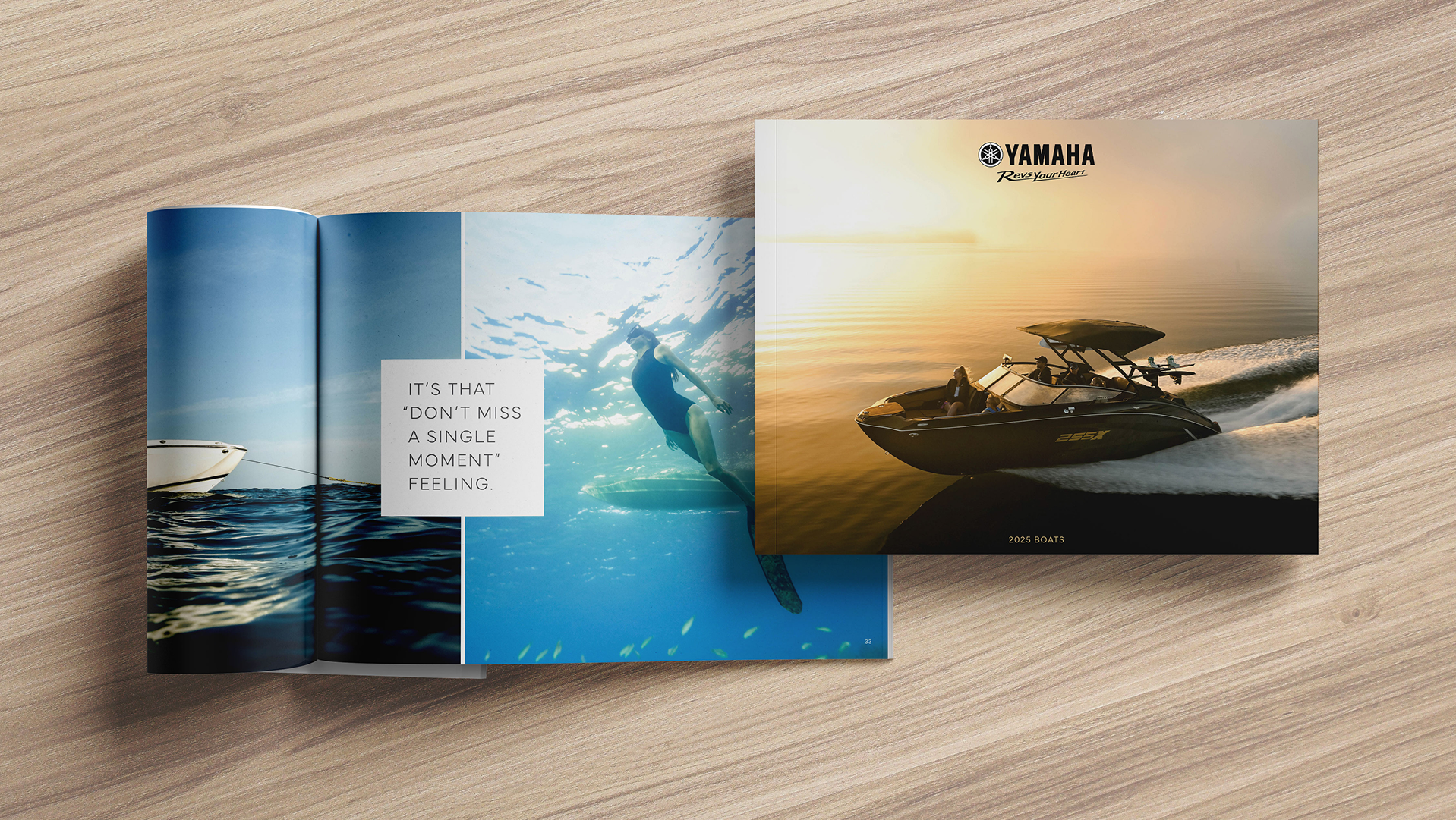 Open Yamaha brochure or catalog on a desk, featuring marine or outdoor lifestyle imagery.