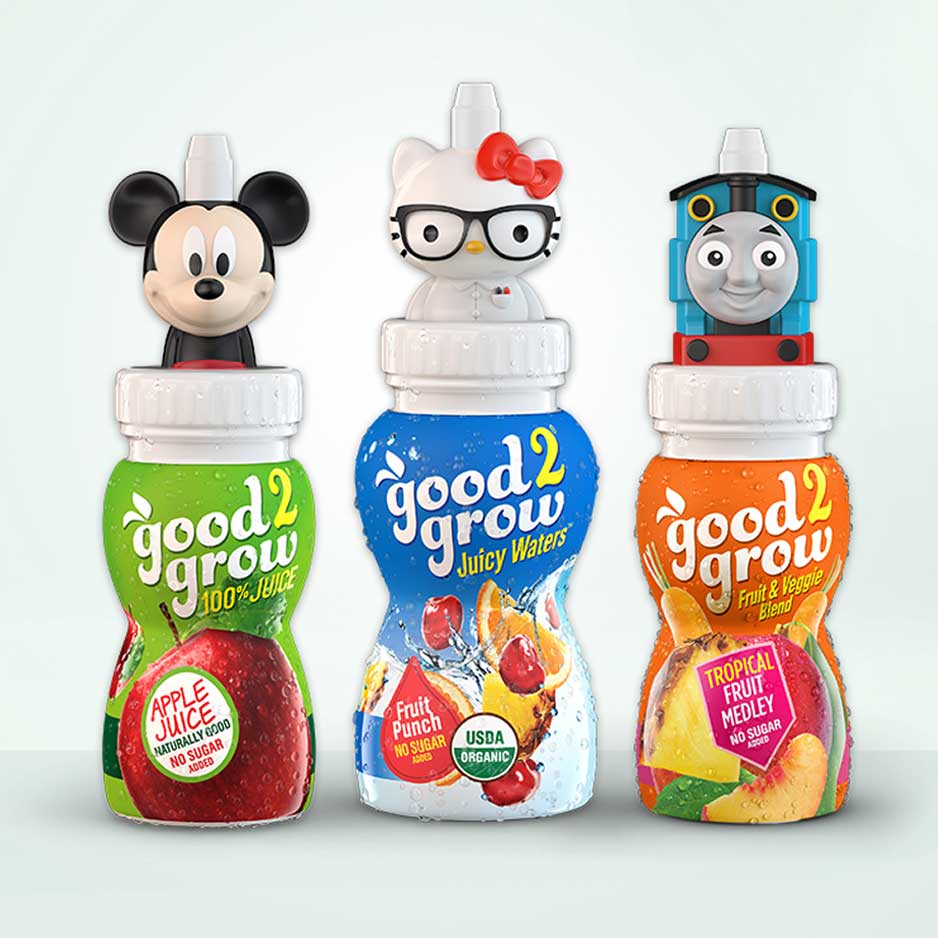 Colorful packaging for Good2Grow drinks with cartoon character tops (Mickey Mouse, Minnie Mouse, and others).