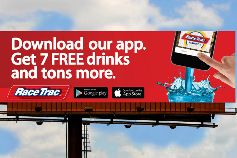 Billboard for RaceTrac with a fountain drink being poured out of a phone, with text saying "Download our app. Get 7 FREE drinks and tons more."